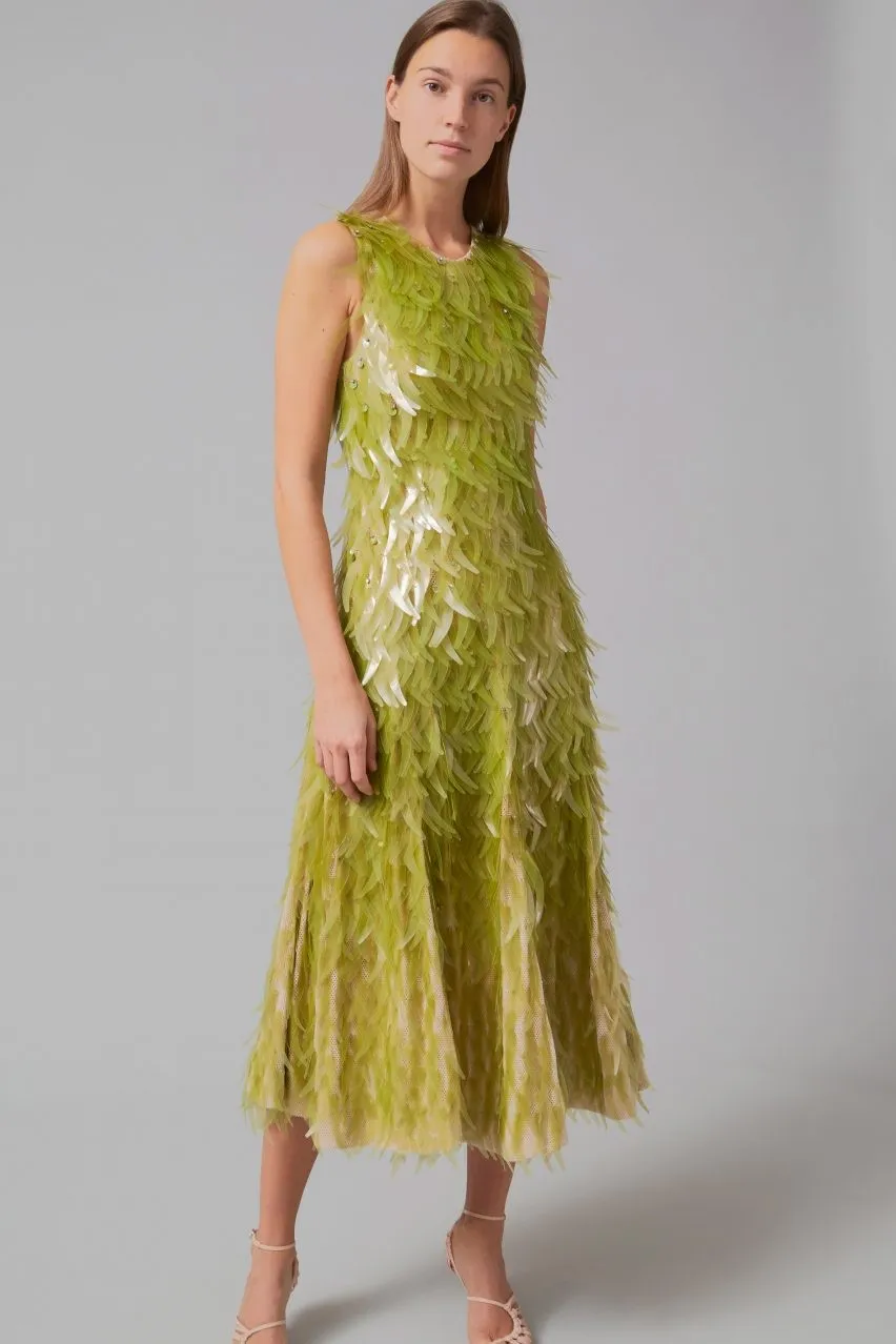 Algae bioplastic fronds cover this petroleum-free dress created by fashion designer Phillip Lim and industrial designer Charlotte McCurdy. The dress has a biodegradable base made of plant fibres, making it free of crude-oil by-products such as synthetic fibres, dyes and plastic sequins.